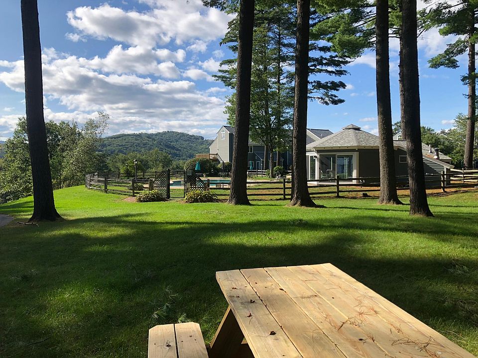 picnic area in pine grove near pool
