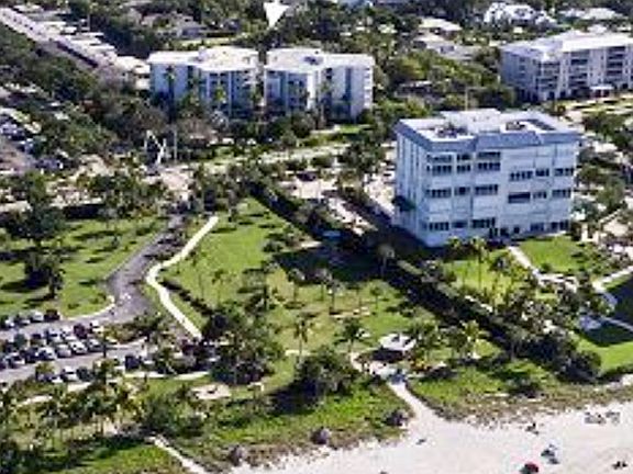 Top floor unit with unobstructed views of Lowdermilk Beach located across the street.