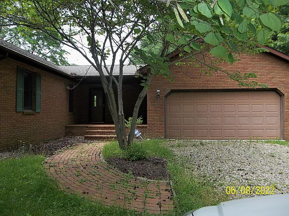 Covered Front Porch and Attached 2 Car Garage