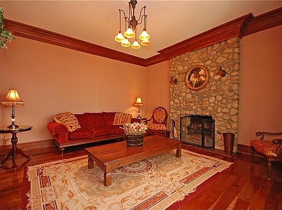 Firelit Formal Living Room overlooks water