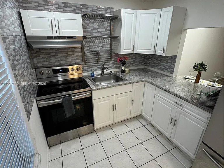 6150 NW 62nd St #106 — Photo 6