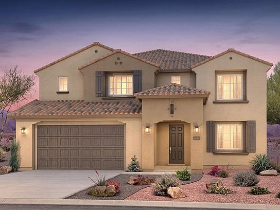 Willowbrook home design Elevation A is complete with pitched tile roof and stucco exterior.