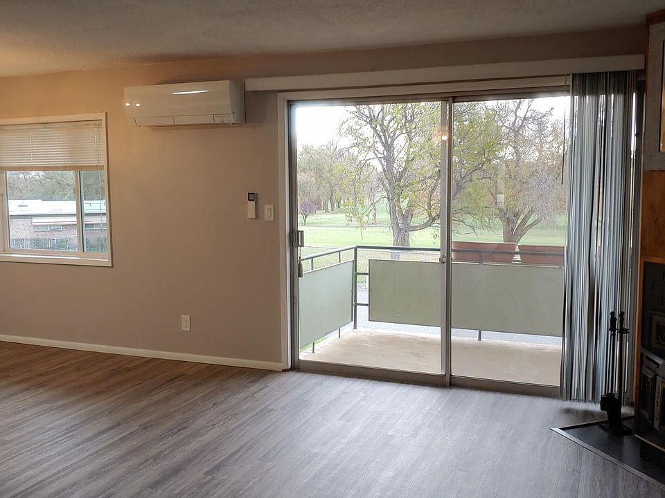 View out of balcony facing golf course. Ductless heater.