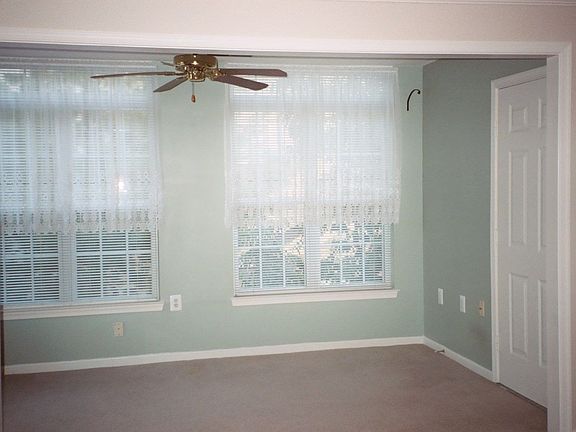 Bright sunroom with fan