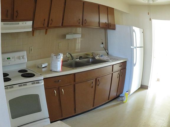 kitchen area showing cabinets and appliances