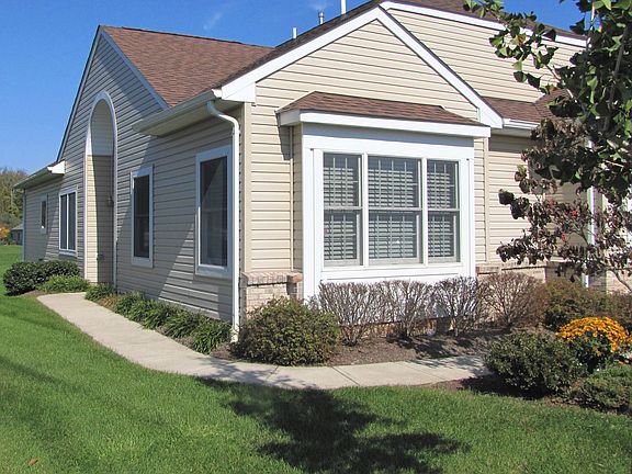 Side view from front w/ nice landscaping