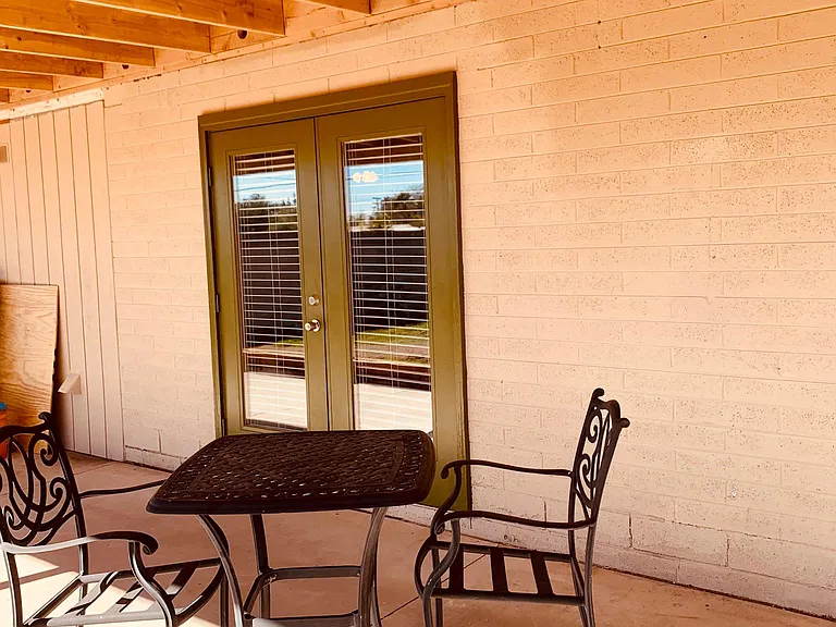 patio with entrance into kitchen dining area