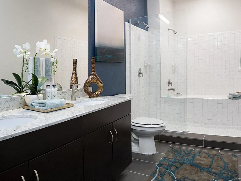Combination shower/tubs in select units