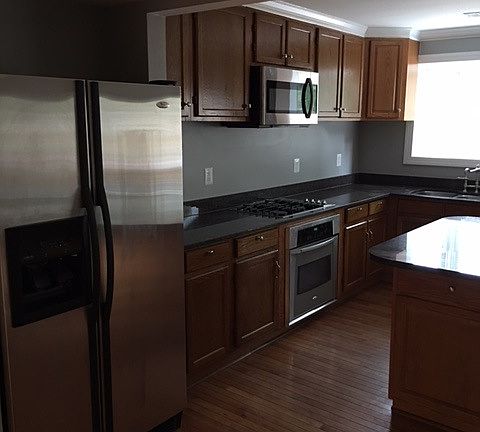 New built-in microwave and dishwasher. Granite counter tops.