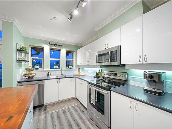 3rd image of 20237 54th Ave #408