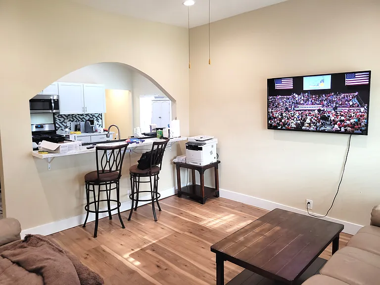 Living room facing kitchen