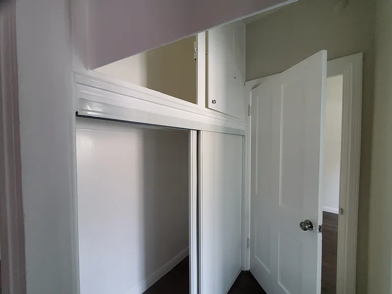 hallway with storage above and below