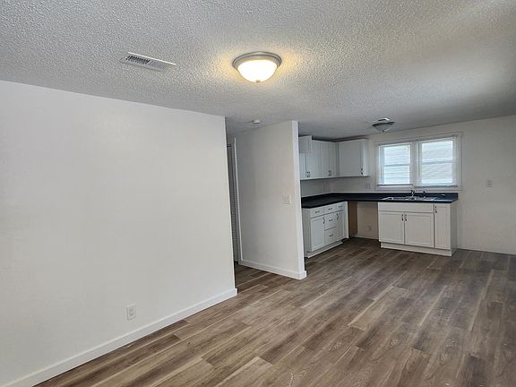 Living room looking into the kitchen