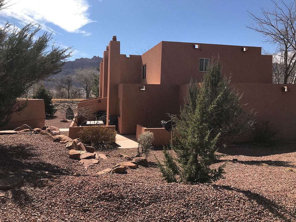 Back of condo. Fenced in yard.