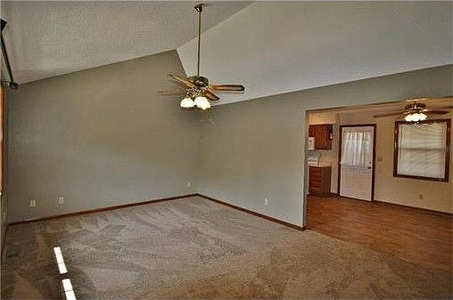 Open floor plan in living room, dining room and kitchen.