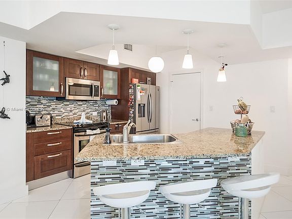 2nd image of 20000 E Country Club Dr APT 705