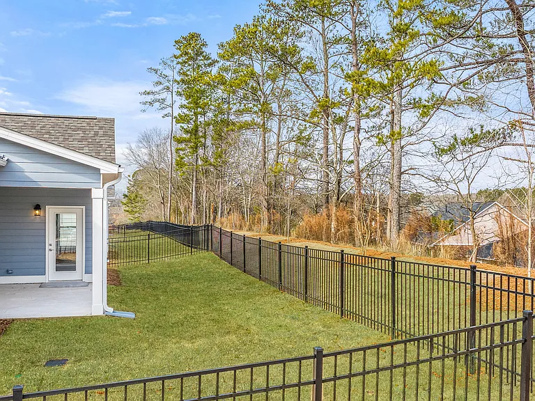 Private fenced backyard retreat.