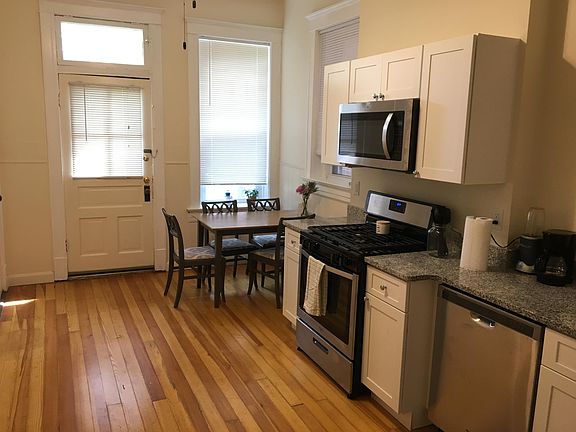 Kitchen with granite countertops and stainless steel appliances.
