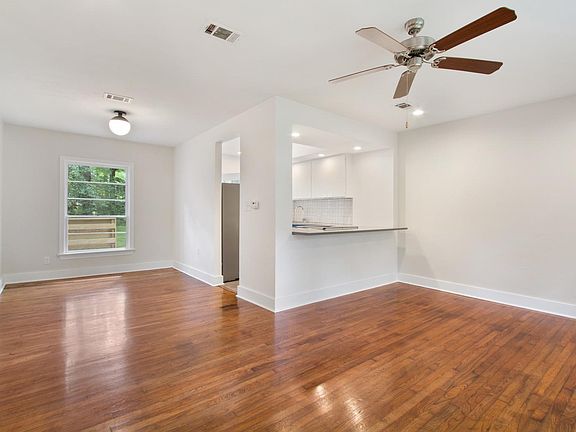 View of living/dining/kitchen from the front door