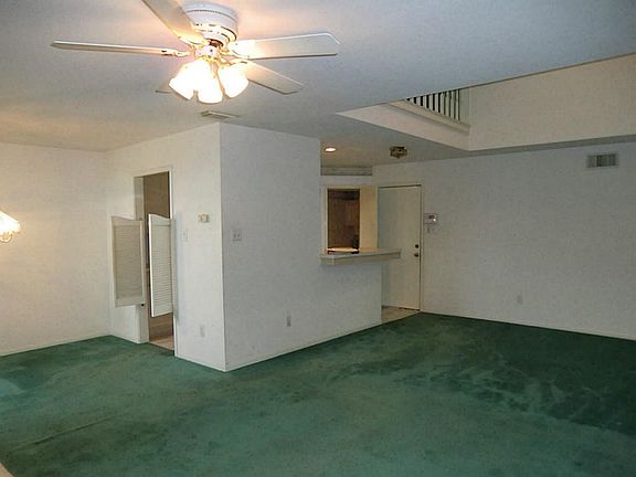 Entering through the front door the kitchen and dining area is on the left and the large living area