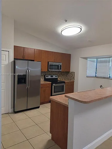 22641 SW 88th Pl #304 Photo 1