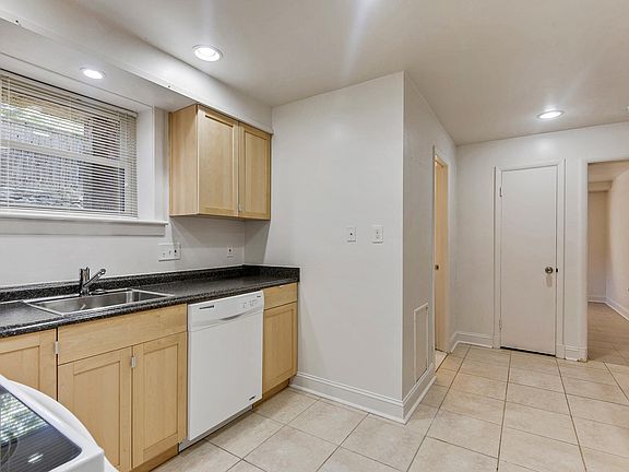 Includes dishwasher cabinets feature soft closing doors and drawers. Pantry/ linen closet pictured.