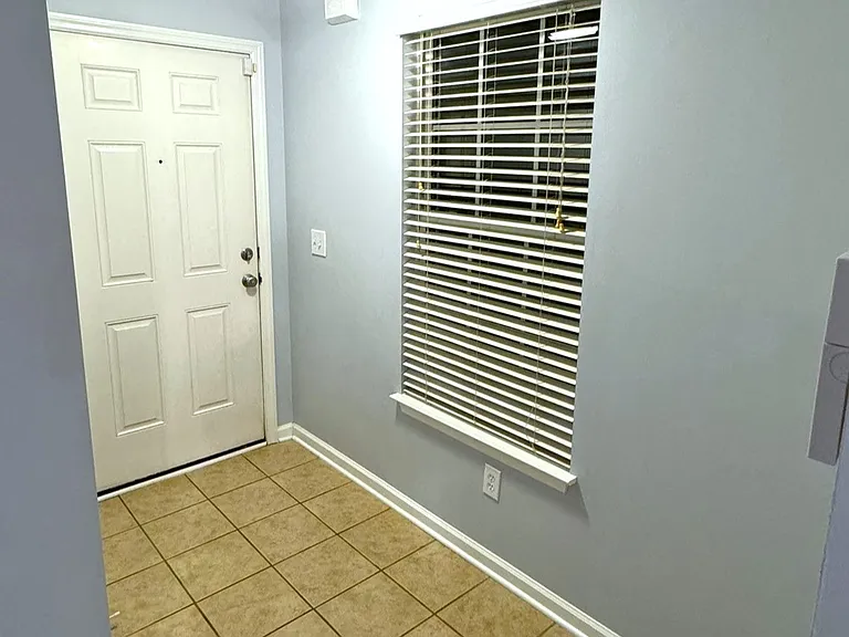 Foyer entry - tiled floor and fresh repose gray paint