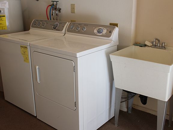 Includes Washer/Dryer and Utility Sink