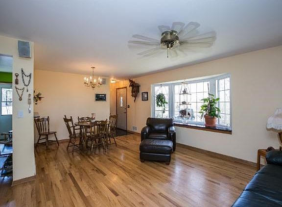 As you enter this lovely home, you will just begin to be impressed!  Gleaming hardwood floors throughout main level are absolutely stunning!