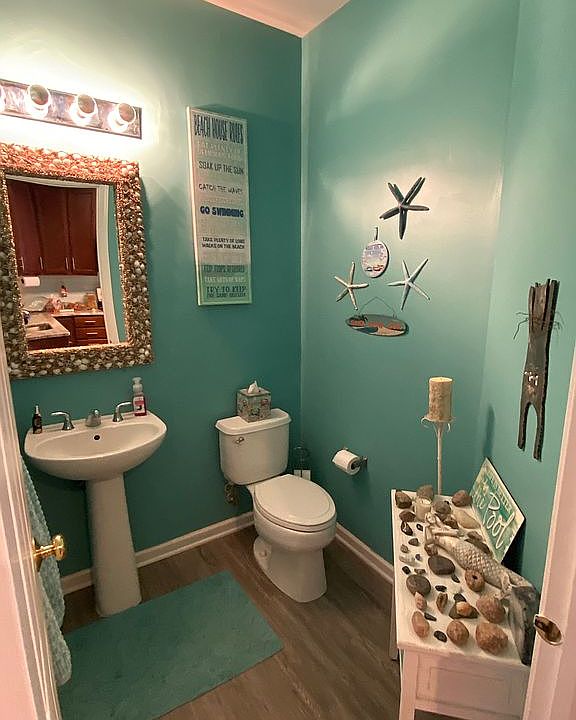 1/2 bath by kitchen
