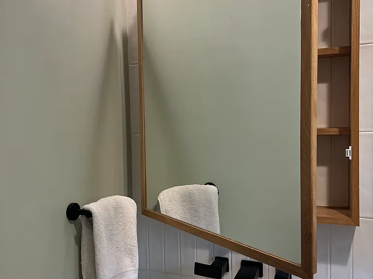 Bathroom vanity and mirror cabinet. Mirror box opens and has storage.