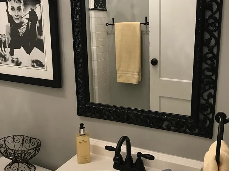 back bathroom with custom finishes and fresh paint