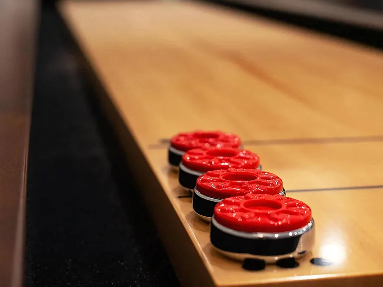 Clubhouse Shuffleboard Table with Bright Red Game Pieces