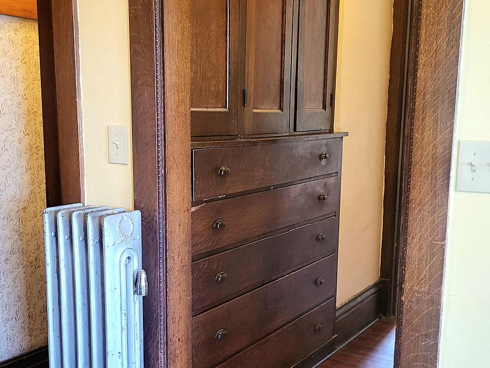 Built in transition cabinets and drawers between kitchen and main foyer.