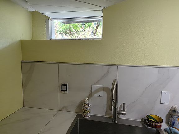 kitchen is a nice yellow. the rest of the home is white.