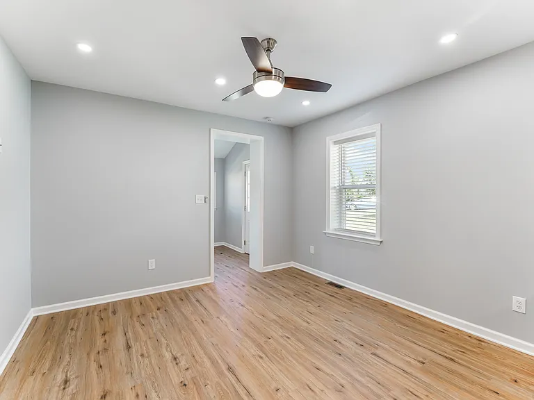 Bedroom has lots of light--and blinds to keep it out when you don't want it there...