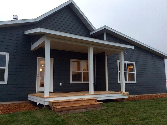 Back of house w/ covered deck