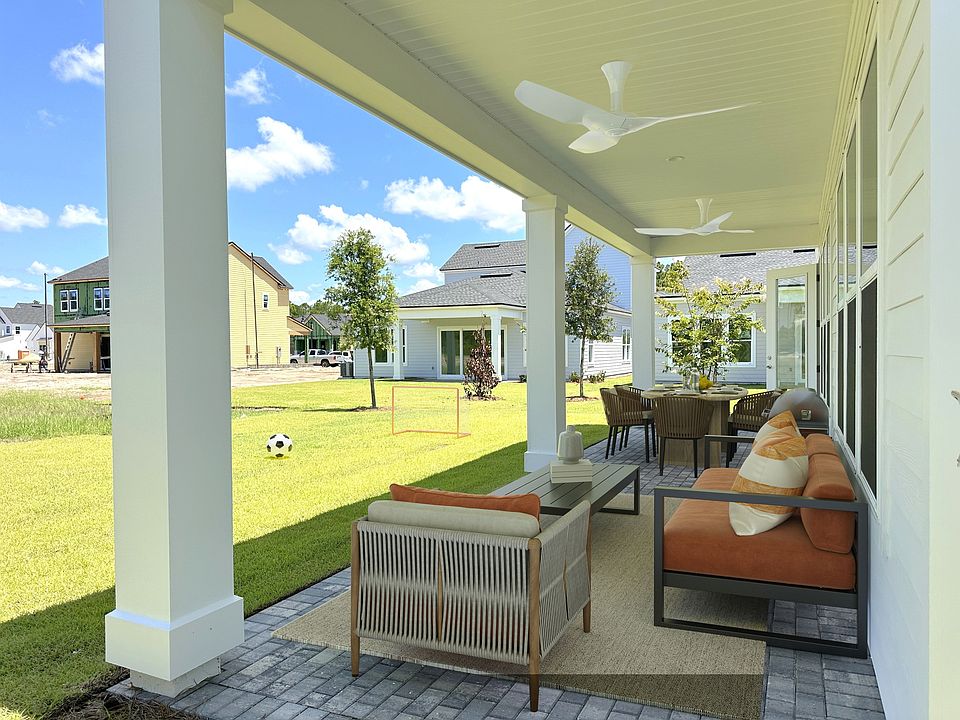 Now with a screened-in porch, enjoy gorgeous sunsets from your back patio, while the playdate happens in YOUR back yard.