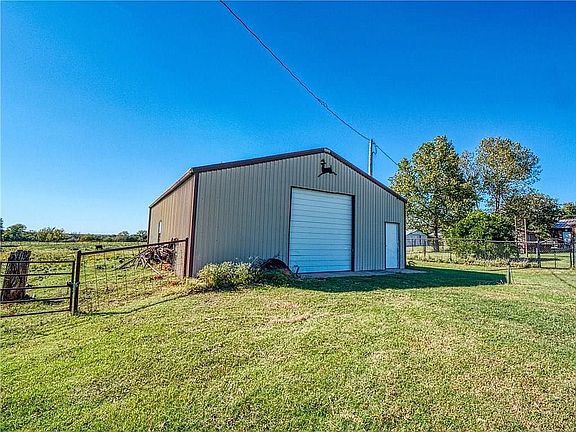 Shop with roll up door for tractor