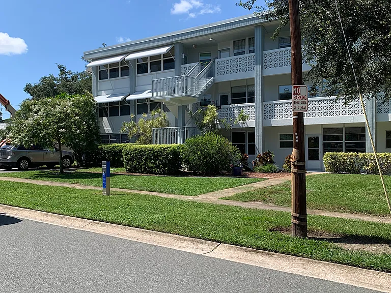 Condo located on second floor end unit pictured here
