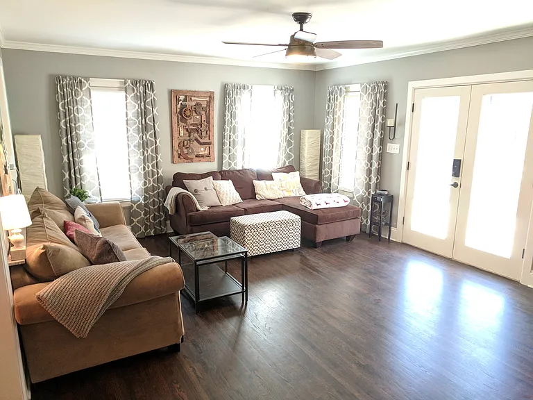Main living area with french doors to deck and back yard