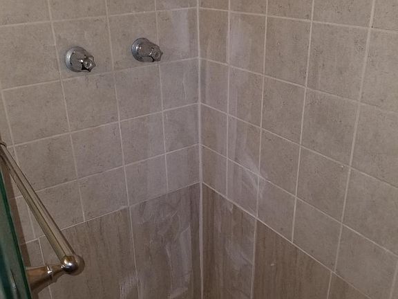 Newly installed shower, tile and shower door