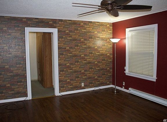 Living room with newer laminate flooring.