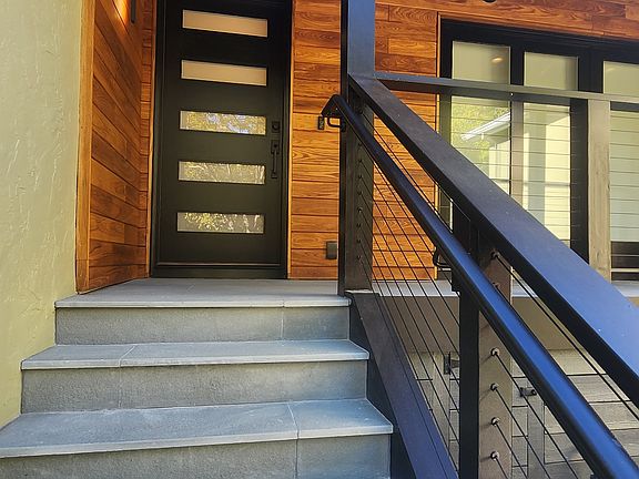 Front porch and stairs with bluestone tile