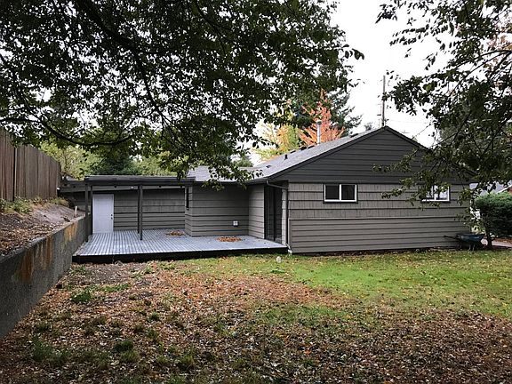 Side yard with large back deck
