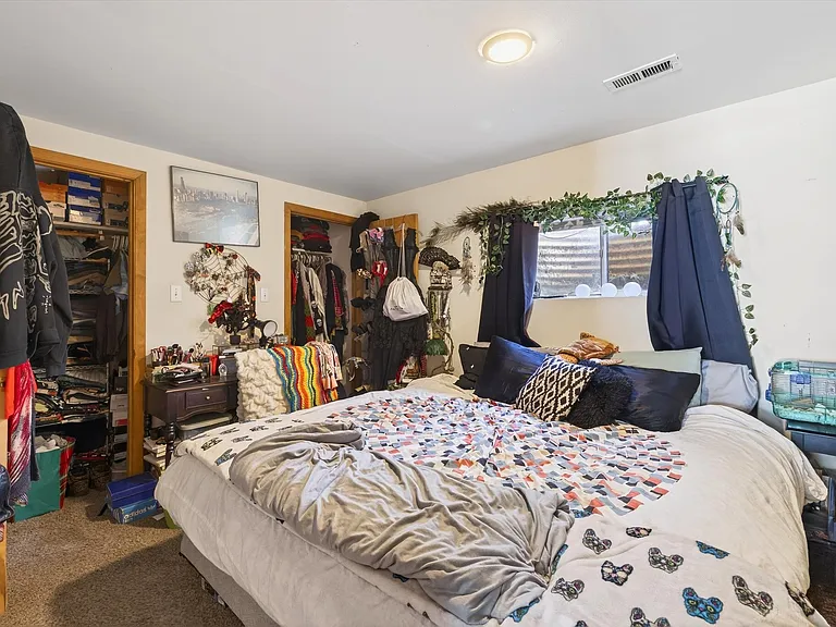 Bedroom one with two closets