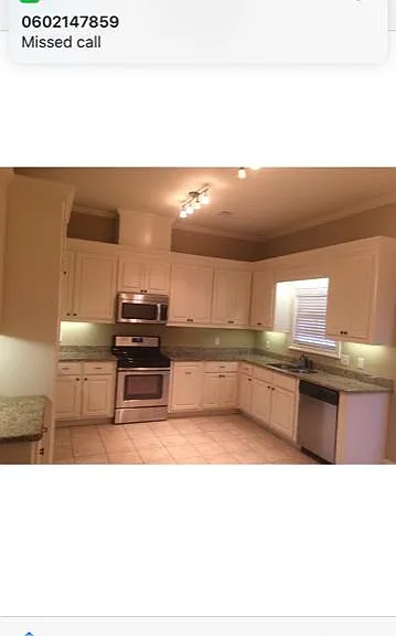 Very large open kitchen, granite counter tops, lots of cabinets.