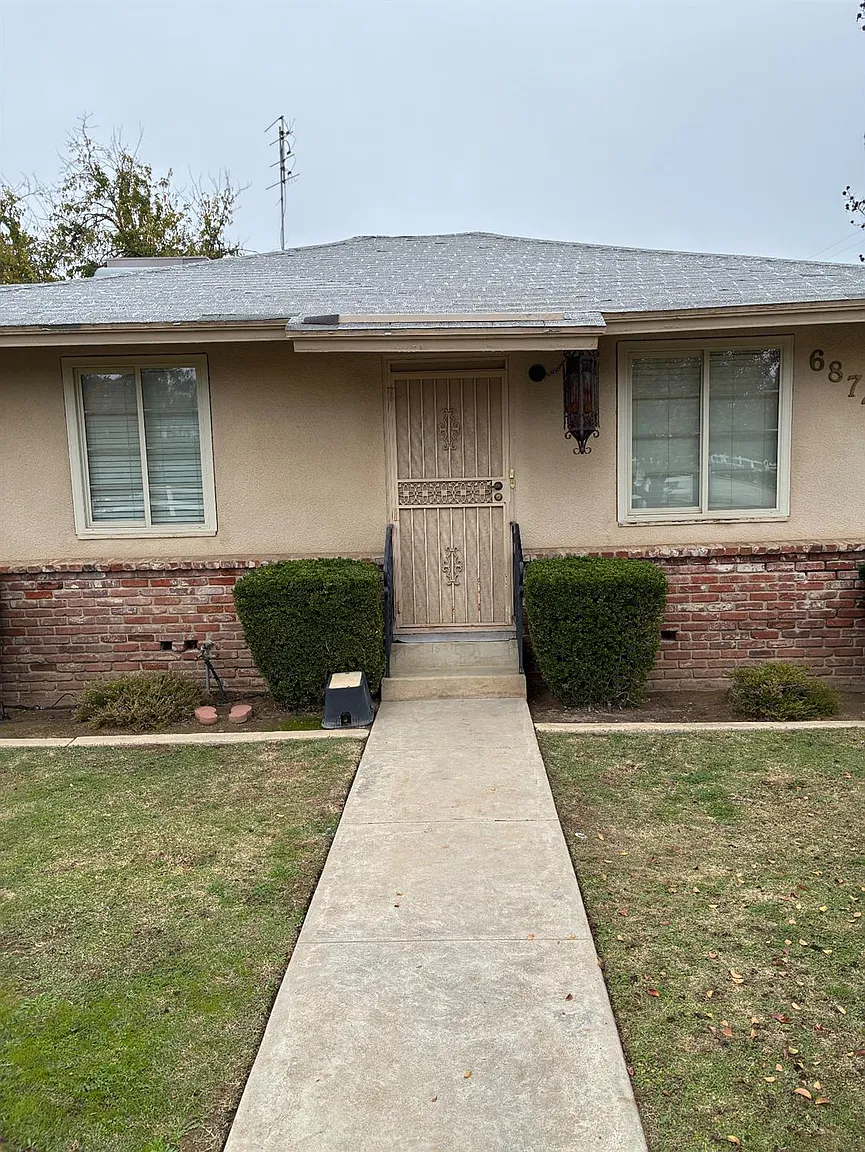 6874 E Olive Ave photo 1
