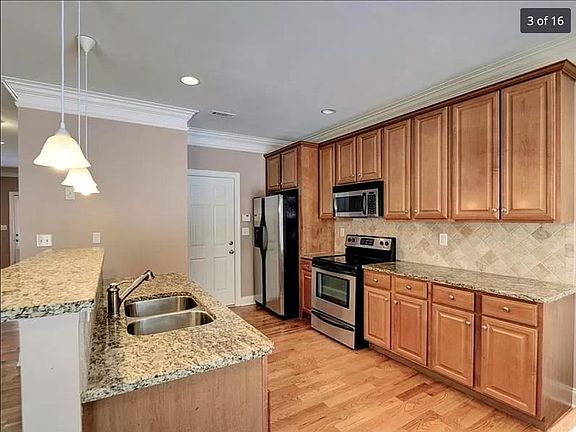 Stainless steel appliances. Disposal sink.