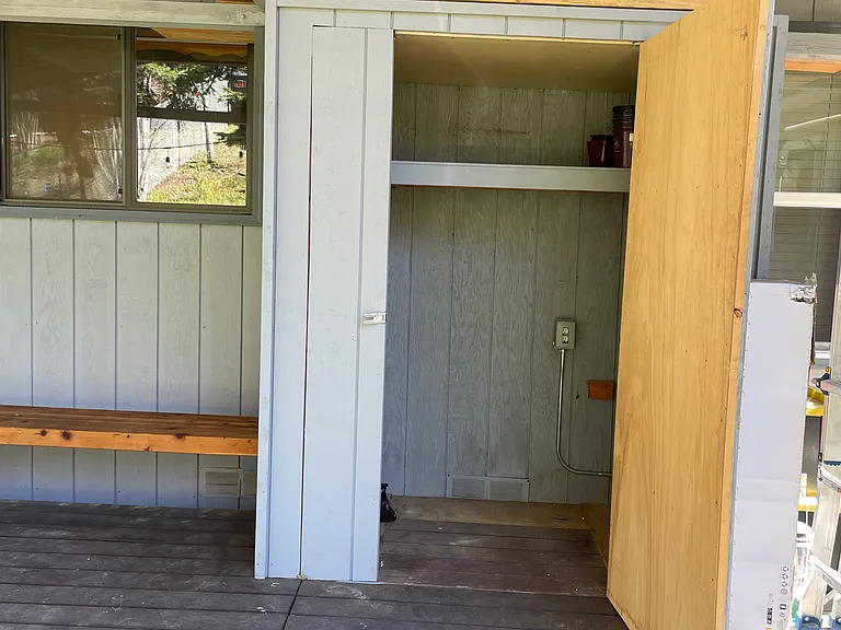 Storage shed on deck for tenant use